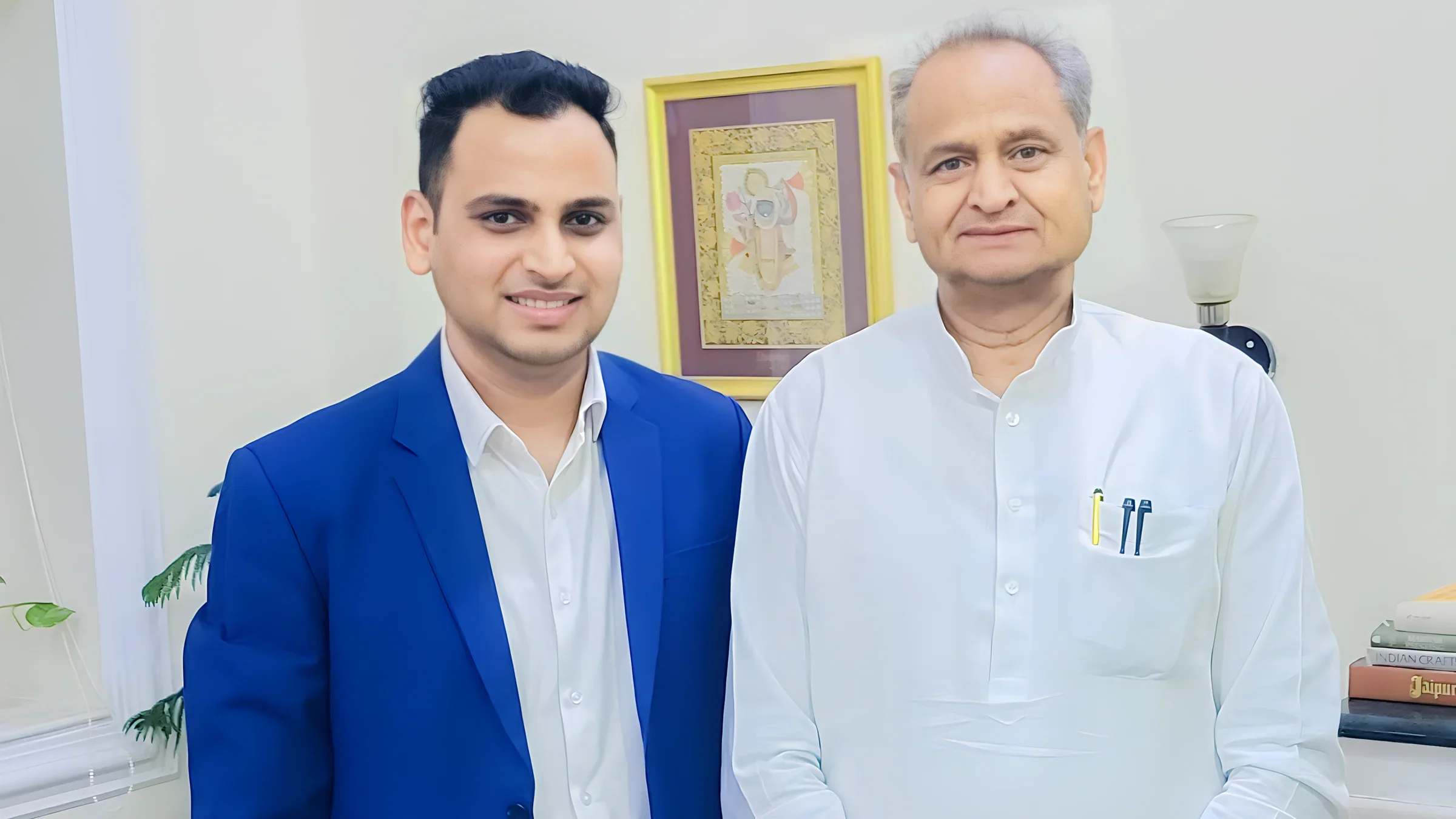 Lithvik Mukesh Sharma with a principal in traditional dress.