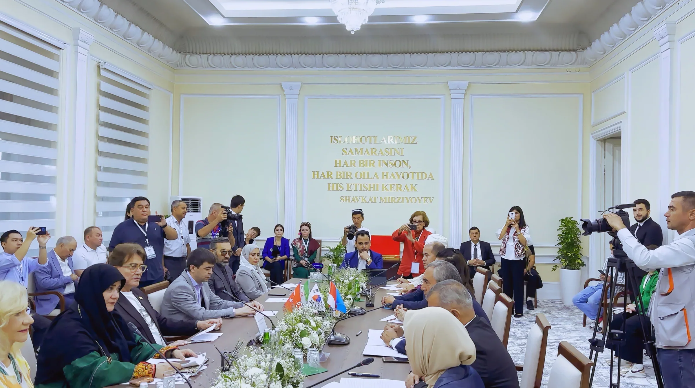 Lithvik Mukesh Sharma at a large conference table.