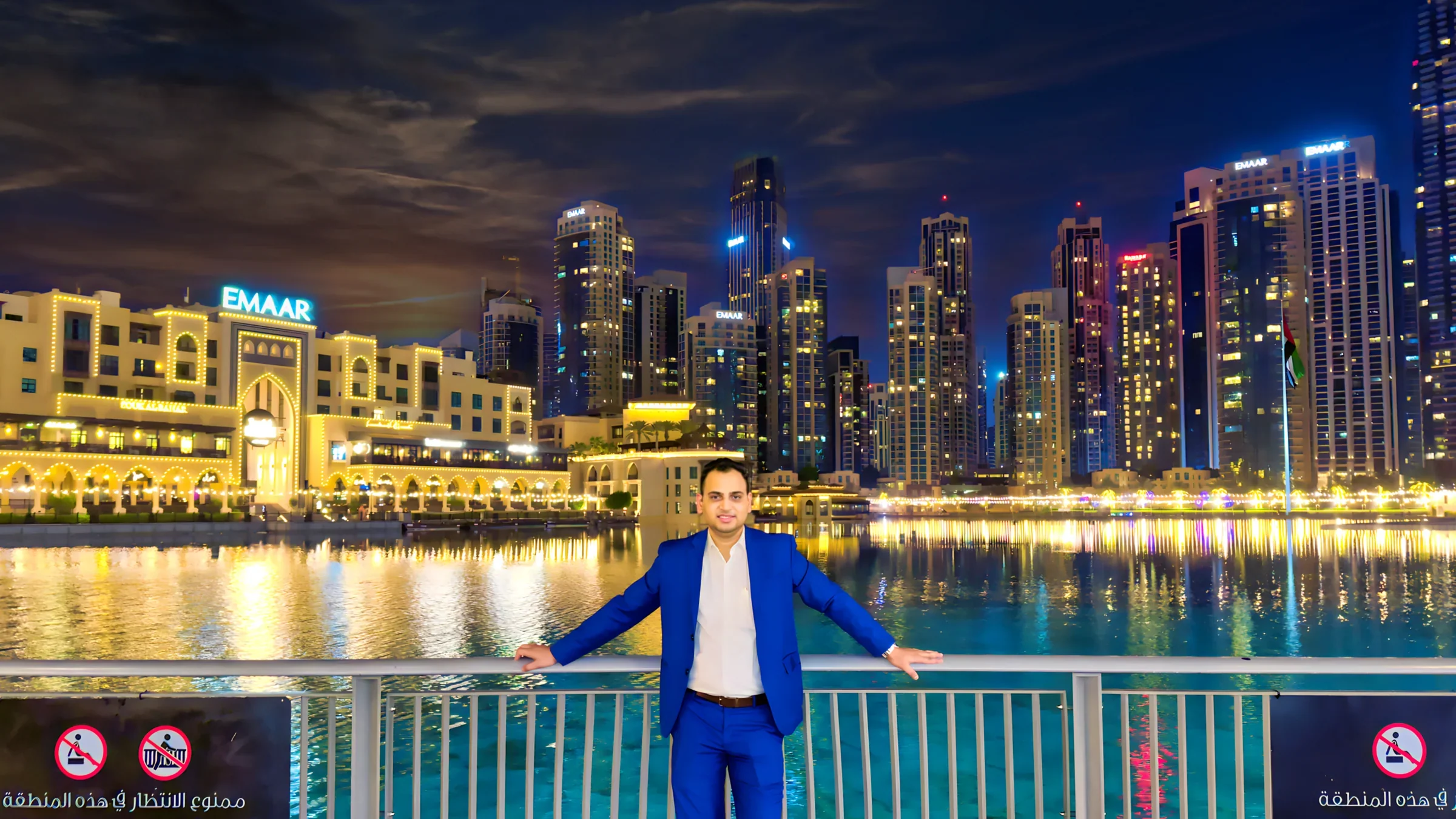 Lithvik Mukesh Sharma on a waterfront promenade at night.