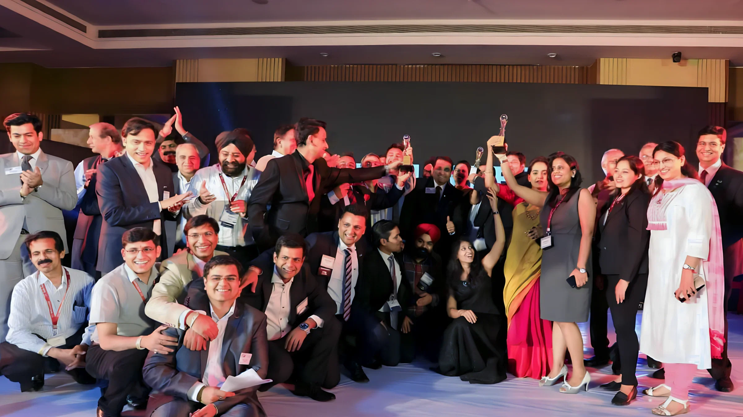 Lithvik Mukesh Sharma is photographed with Dr. Jyoti Kush at his business network award ceremony.