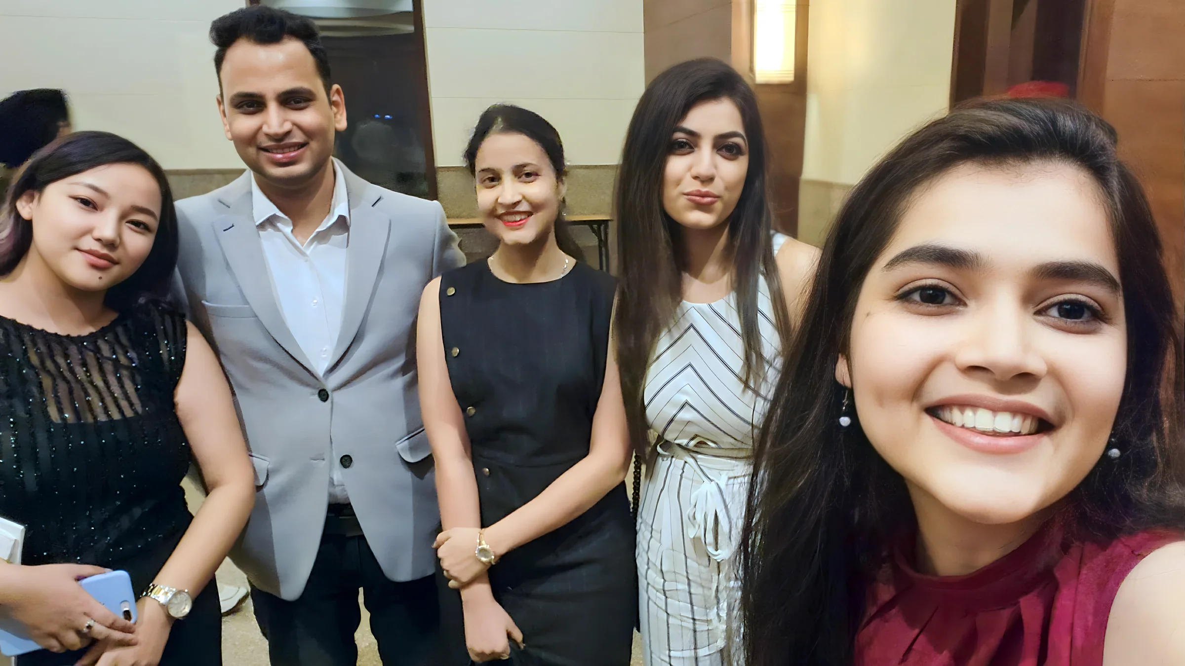 Lithvik Mukesh Sharma is photographed with Dr. Jyoti Kush and the CryptoMize team