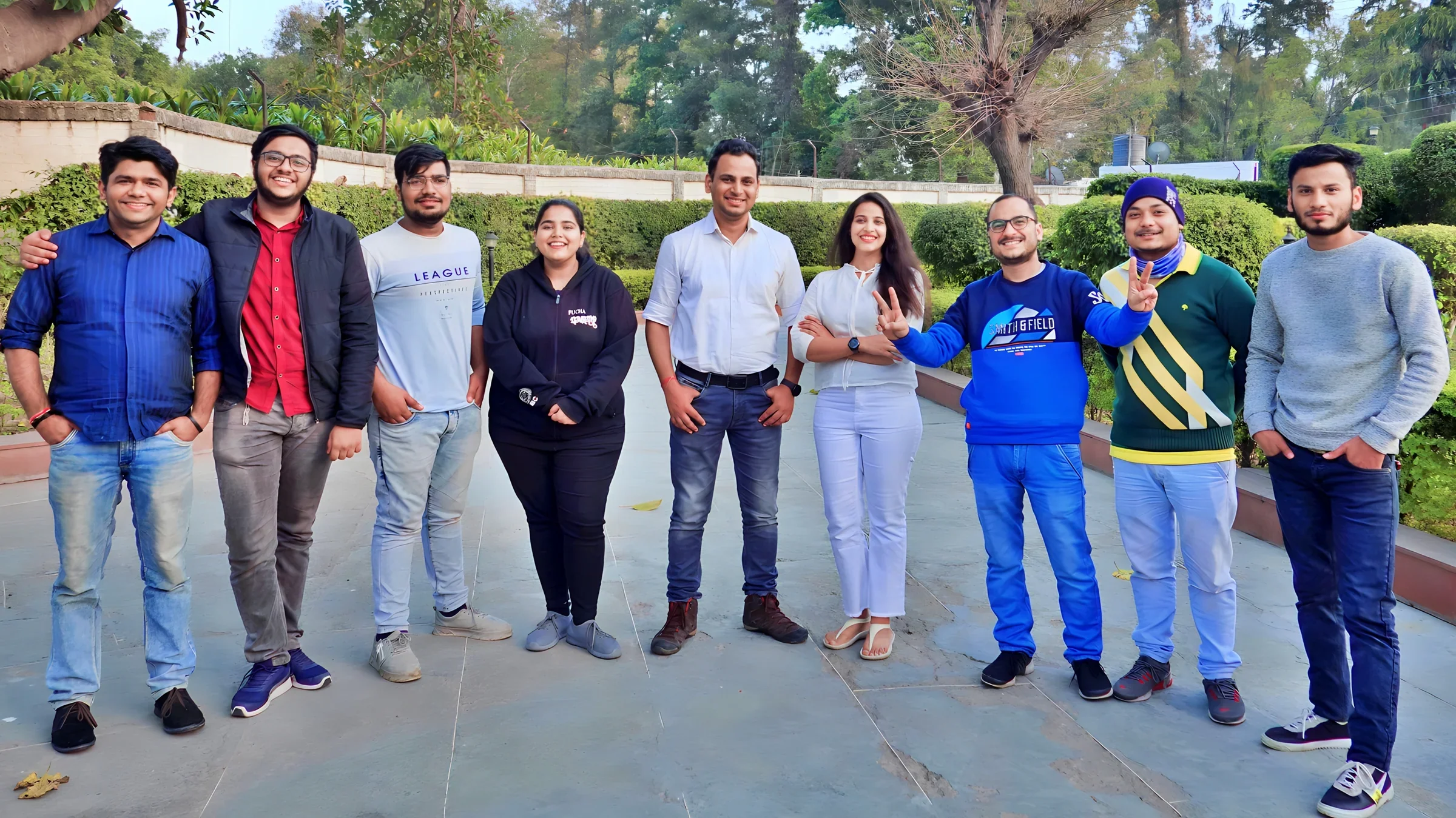 Lithvik Mukesh Sharma is photographed with the CryptoMize founder and interns.