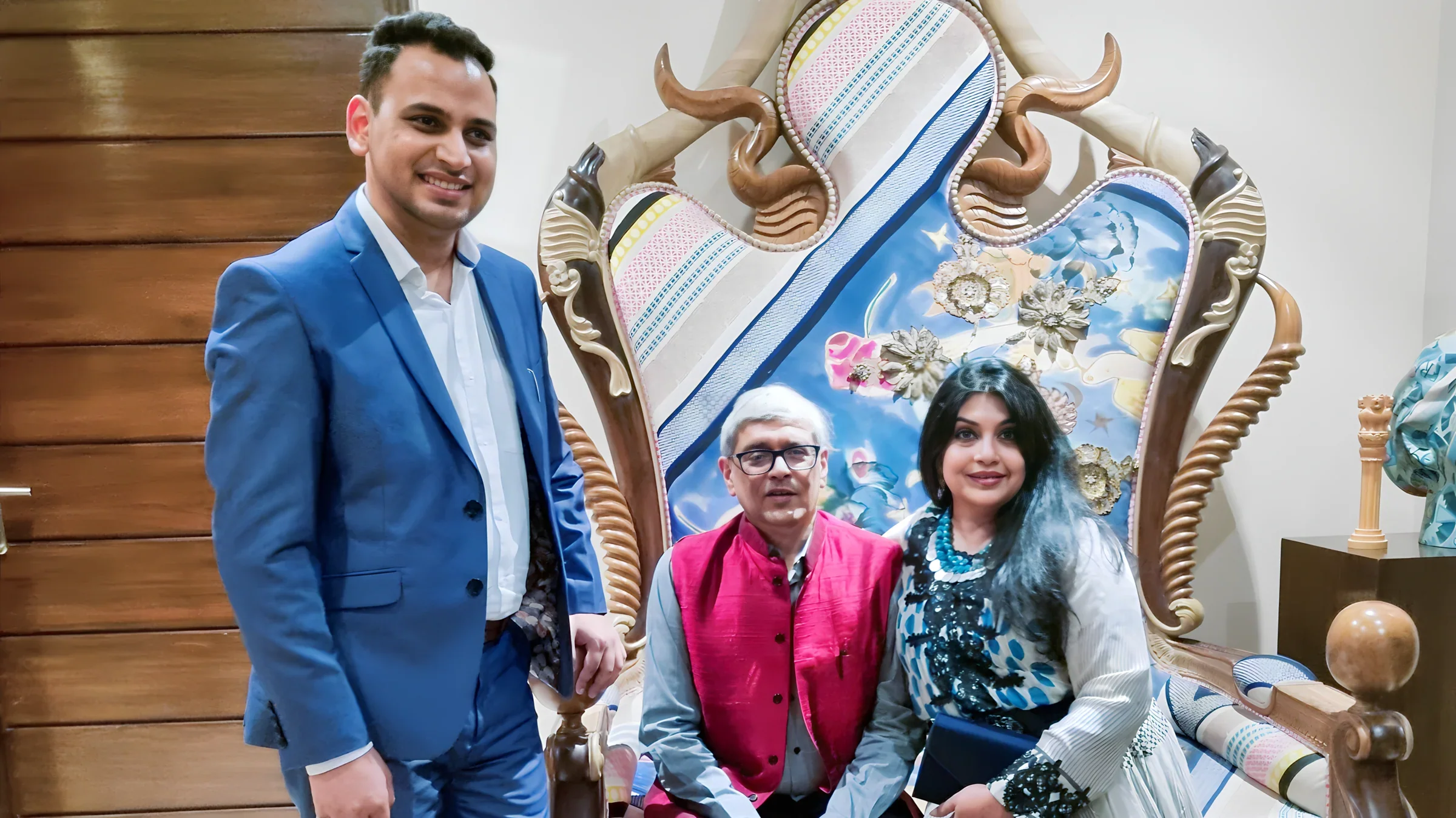 Lithvik Mukesh Sharma is photographed with an economist, author, and writer and his wife.