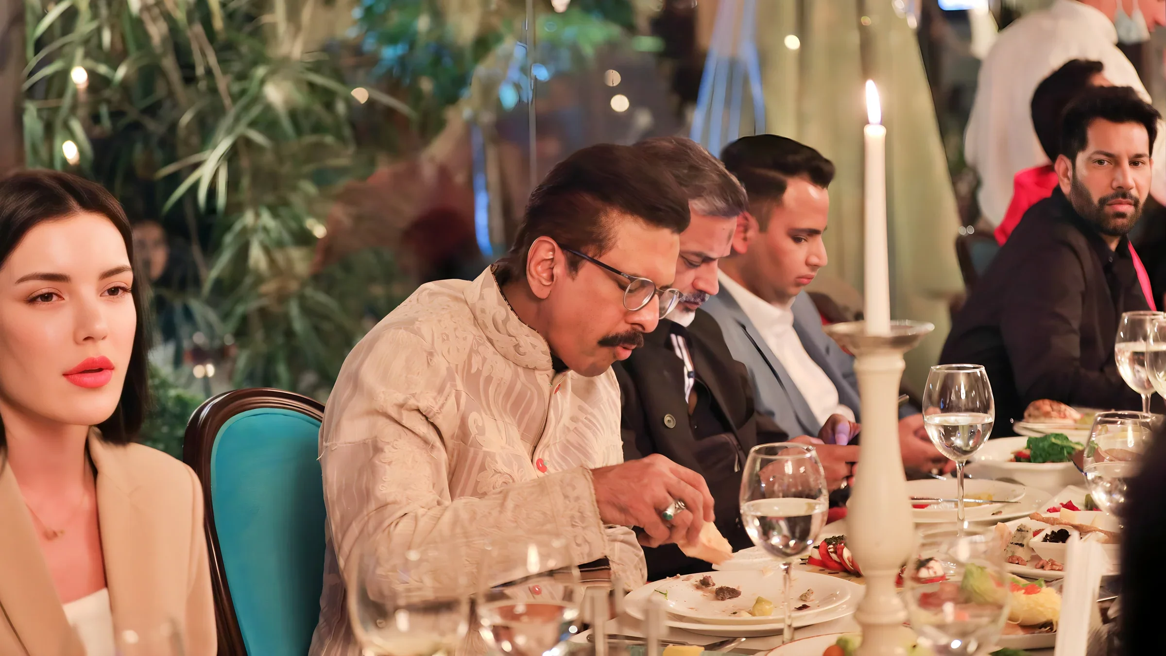 Lithvik Mukesh Sharma is photographed with Mika Singh.