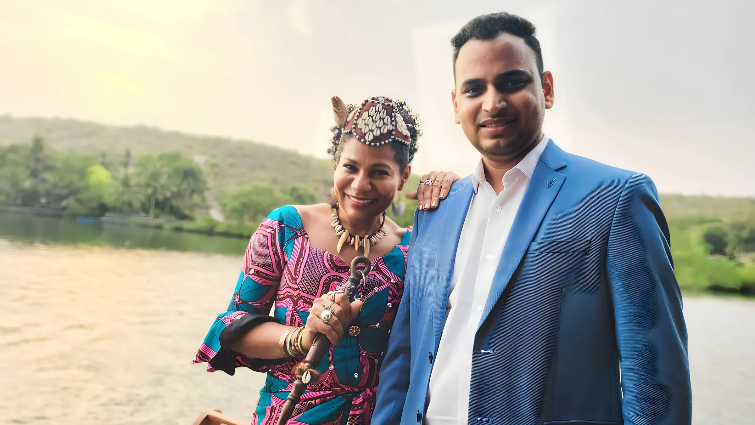 Lithvik Mukesh Sharma is photographed with Queen Diambi at an indoor reception