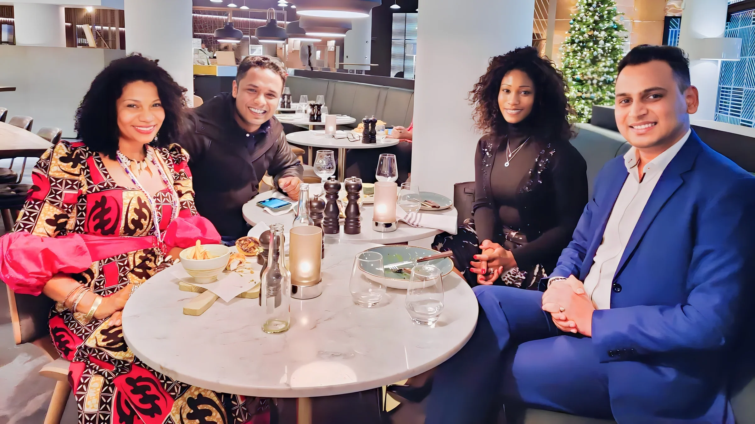 Lithvik Mukesh Sharma hosts Sachin Singh, Queen Diambi, and Cinthia Loïs Ta Thomsen (Member of Parliament of the State of the African Diaspora and Founder and Chief Executive of the African Chamber of Commerce Scandinavia (ACCS))